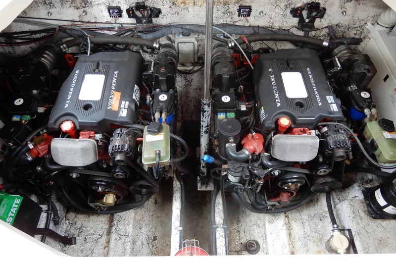 Slide: The Image of Engine compartment of a 2005 Rinker 360 Express Cruiser with dual Volvo Penta engines. - 24