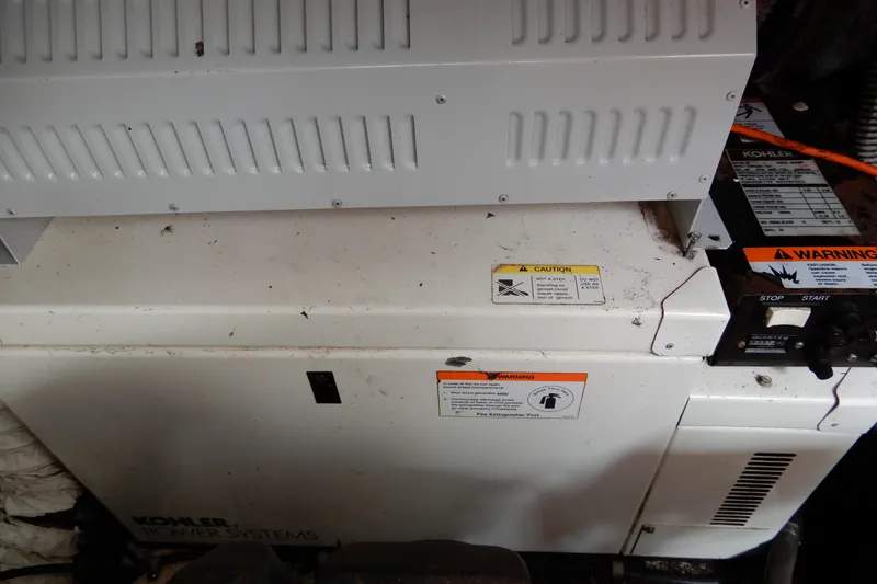 Slide: The Image of Kohler power system in 2005 Rinker 360 Express Cruiser engine room. - 29