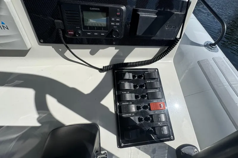 Slide: The Image of Control panel of a 2014 Zodiac 850 boat with Garmin device. - 4