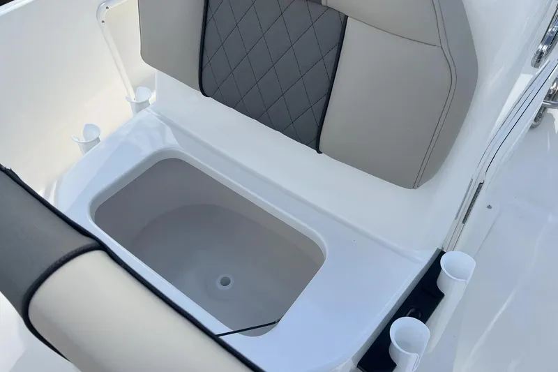 Slide: The Image of 2026 Key West 1720 Center Console boat seat with storage compartment. - 13