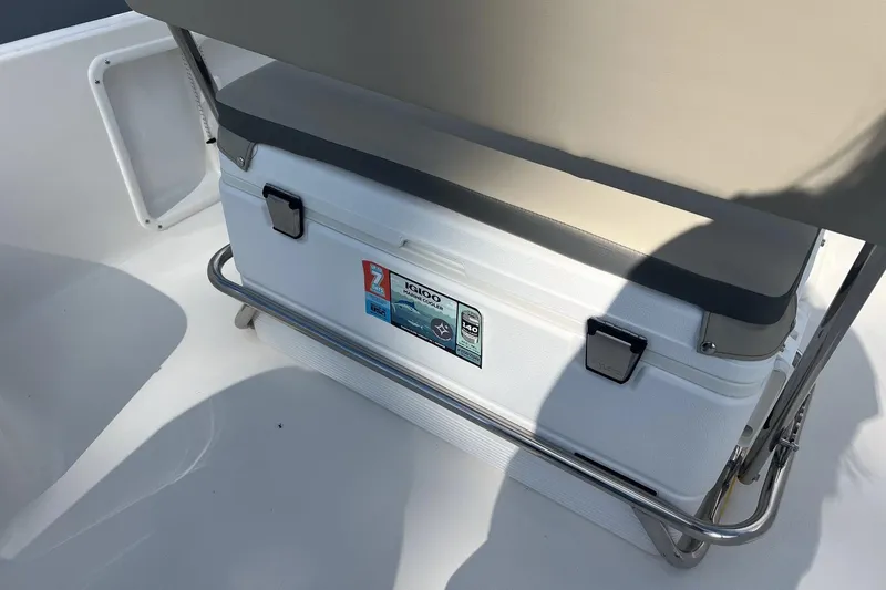 Slide: The Image of 2026 Key West 1720 Center Console boat with Igloo cooler under seat. - 9