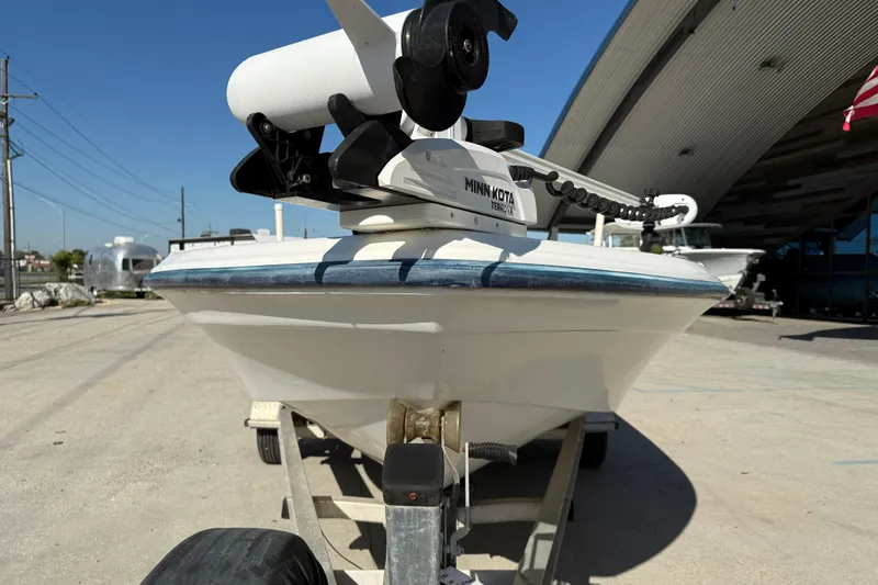 Slide: The Image of 2002 Fishmaster 196 Travis Edition boat with Minn Kota motor on trailer. - 4