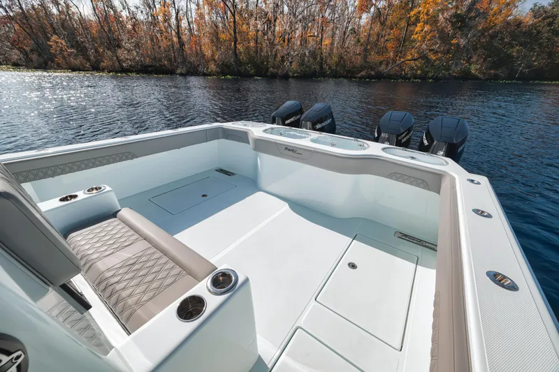 Slide: The Image of Luxurious 2026 Front Runner 37' Catamaran interior with sleek seating and powerful engines. - 13