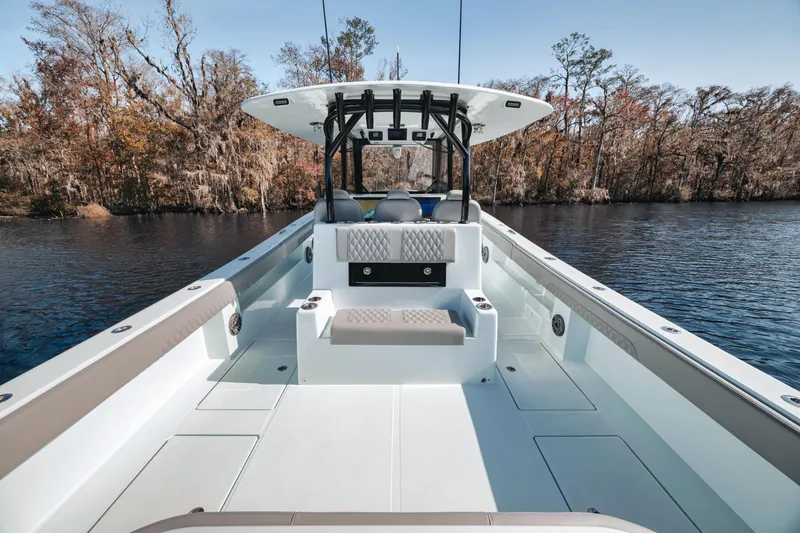 Slide: The Image of 2026 Front Runner 37' Catamaran on serene lake with autumn trees in background. - 17
