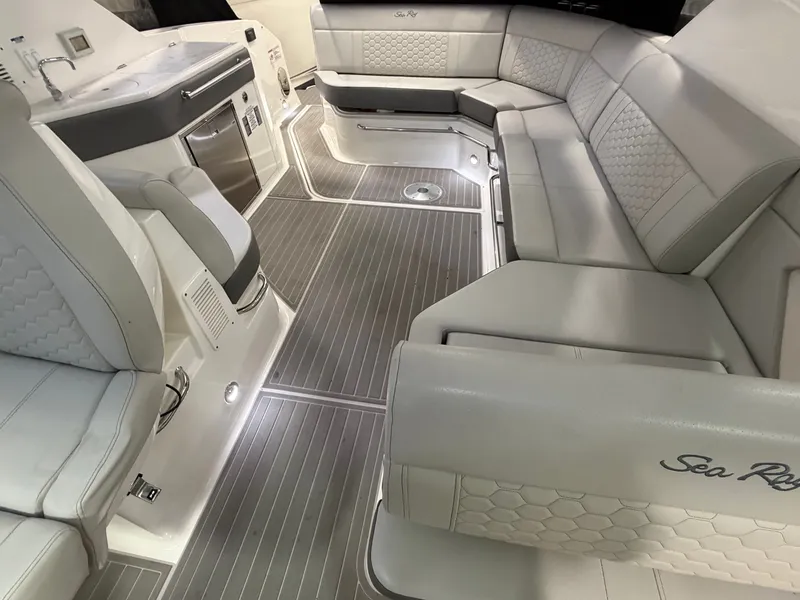 Slide: The Image of Luxurious interior of 2023 Sea Ray Sundancer 320 Outboard with elegant seating and modern amenities. - 12