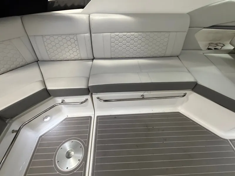 Slide: The Image of 2023 Sea Ray Sundancer 320 Outboard interior seating with modern design and sleek flooring. - 13