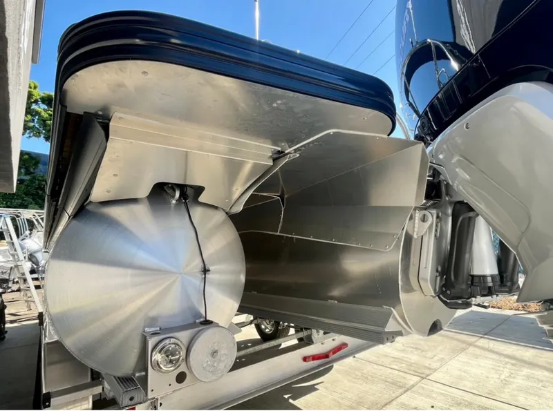 Slide: The Image of 2025 Barletta Lusso 23UC pontoon boat undercarriage, showcasing sleek aluminum design. - 24