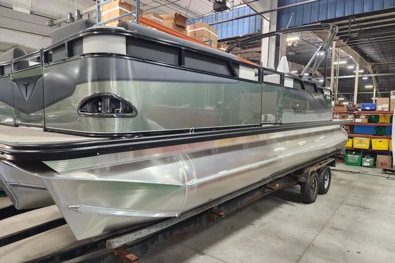 The Image of 2026 Avalon TRIPLETOON Venture CRB with Patio Pad in a warehouse setting. - 0