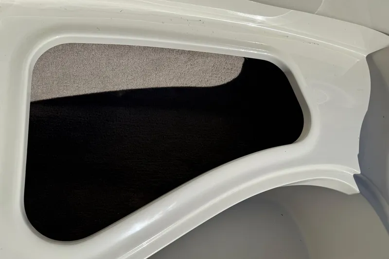Slide: The Image of 2019 Stingray 198 LX boat interior detail with white and black contrast. - 16