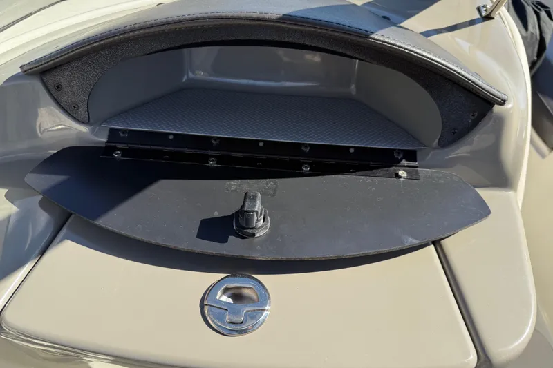 Slide: The Image of Open storage compartment on a 2019 Stingray 198 LX boat. - 34