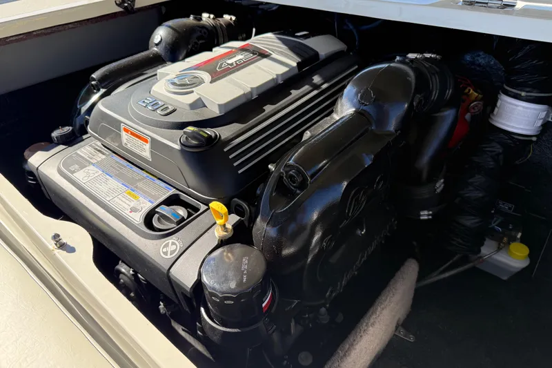 Slide: The Image of 2019 Stingray 198 LX engine compartment showcasing a powerful 200 HP motor. - 41