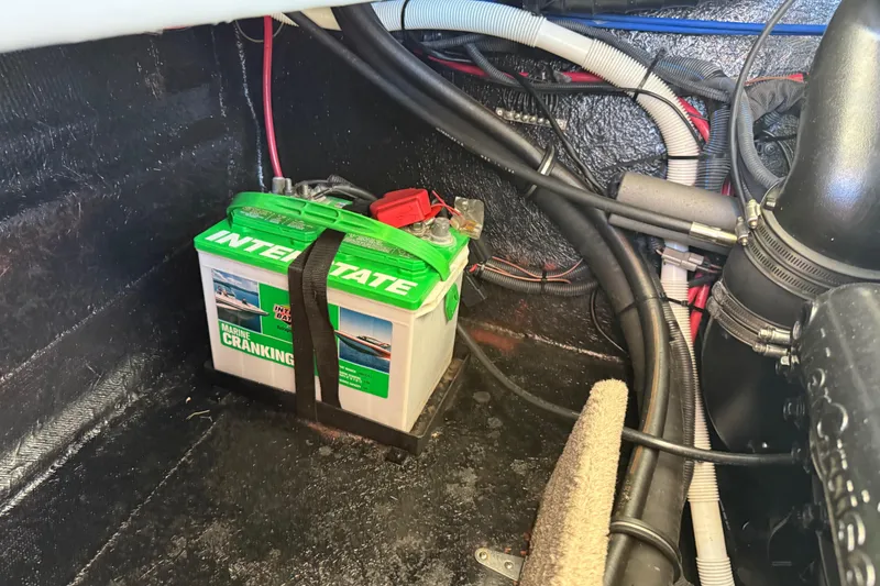 Slide: The Image of Battery compartment of a 2019 Stingray 198 LX with Interstate marine battery. - 42