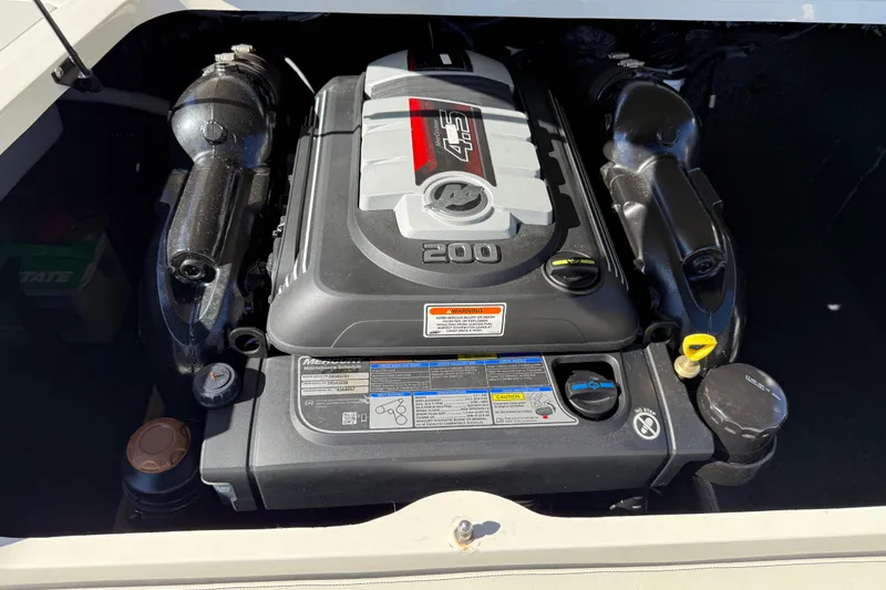 Slide: The Image of 2019 Stingray 198 LX engine compartment with 200 HP motor, detailed view. - 43