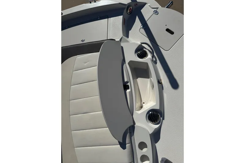 Slide: The Image of 2019 Stingray 198 LX boat interior with seating and storage compartments. - 47
