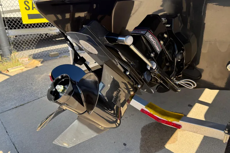 Slide: The Image of 2019 Stingray 198 LX boat with MerCruiser outdrive, close-up view. - 8