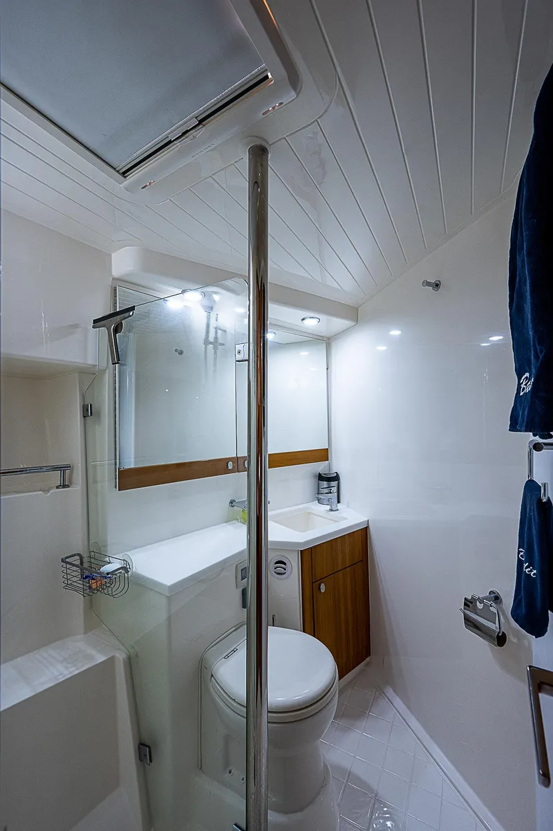 Slide: The Image of 2014 Maritimo 470 Offshore Convertible yacht with spacious deck and luxurious interior. - 10