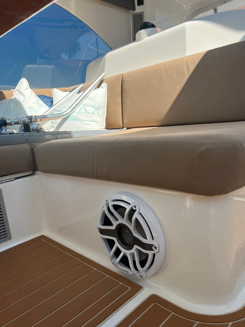 Slide: The Image of 2014 Maritimo 470 Offshore Convertible boat speaker and handle detail. - 33