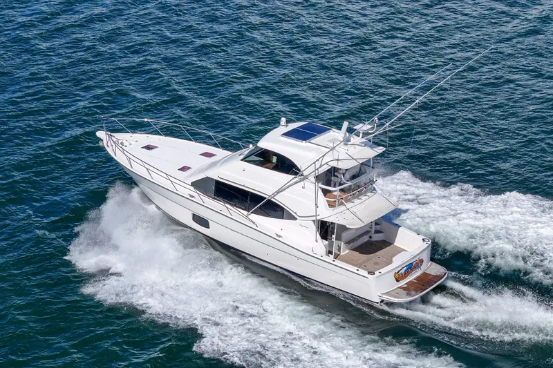 Slide: The Image of Luxurious interior of 2014 Maritimo 470 Offshore Convertible yacht with elegant wood finishes. - 40