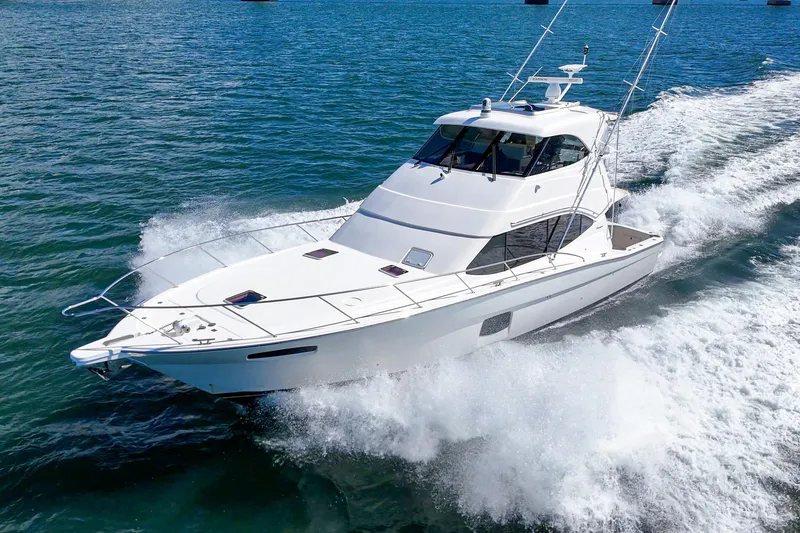 Slide: The Image of Electrical panel on 2014 Maritimo 470 Offshore Convertible yacht, featuring polished wood interior. - 42