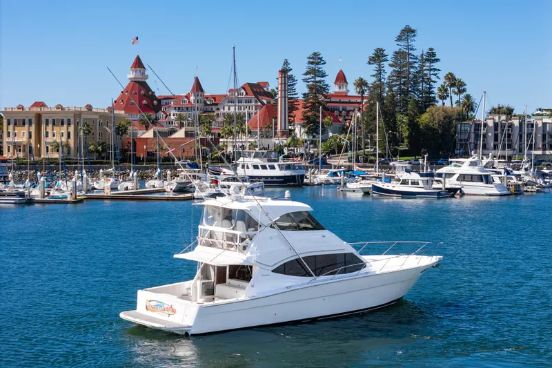 Slide: The Image of Luxurious bathroom in 2014 Maritimo 470 Offshore Convertible yacht, featuring modern fixtures and wood accents. - 52