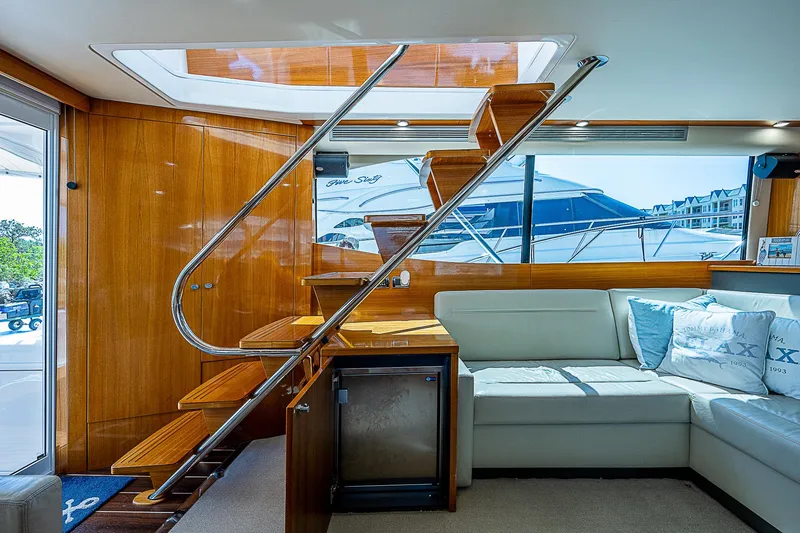 Slide: The Image of 2014 Maritimo 470 Offshore Convertible yacht bow on open water. - 6