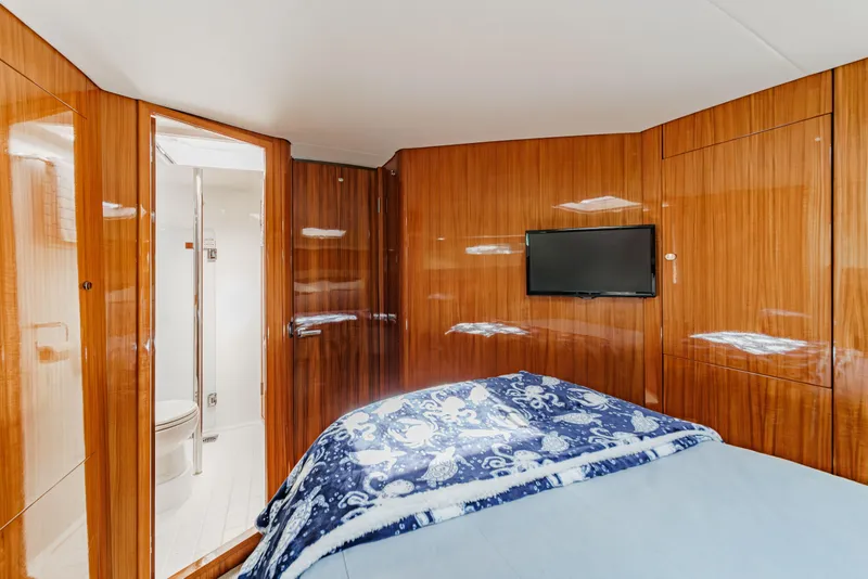 Slide: The Image of Open storage compartment on 2014 Maritimo 470 Offshore Convertible boat. - 66