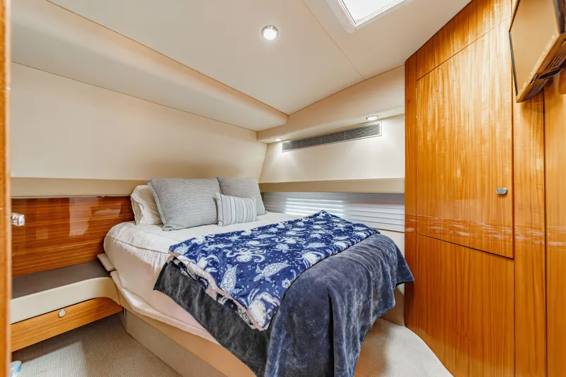 Slide: The Image of Engine room of 2014 Maritimo 470 Offshore Convertible with fire extinguisher and equipment. - 69