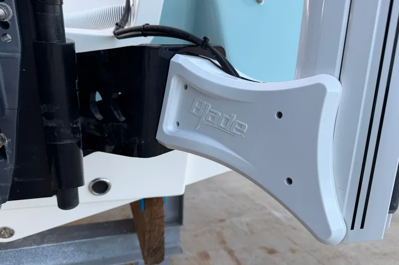 Slide: The Image of Close-up of 2023 Tidewater 2410 Bay Max boat component with Blade branding. - 21