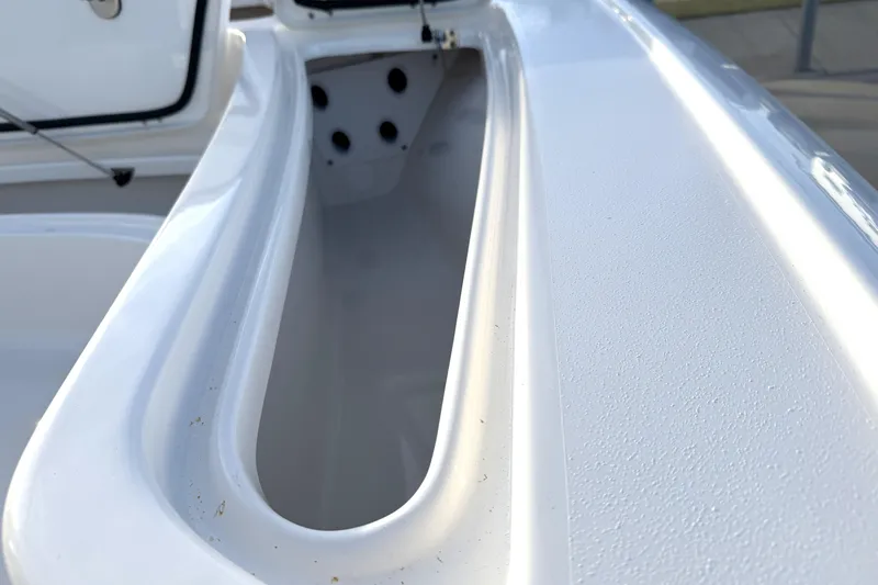 Slide: The Image of 2023 Tidewater 2410 Bay Max boat interior storage compartment detail. - 29