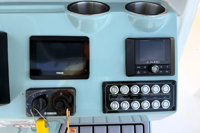 Slide: The Image of Control panel of 2023 Tidewater 2410 Bay Max boat with Yamaha and JL Audio systems. - 40