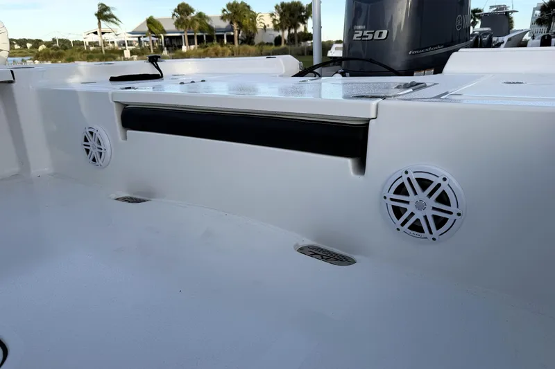 Slide: The Image of 2023 Tidewater 2410 Bay Max boat interior with speakers and Yamaha 250 engine. - 46