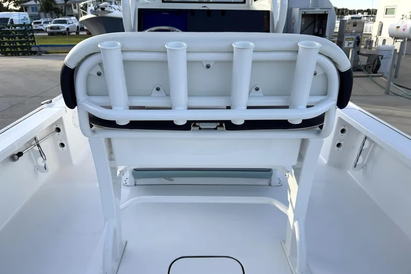 Slide: The Image of 2023 Tidewater 2410 Bay Max boat interior with rod holders and seating. - 53