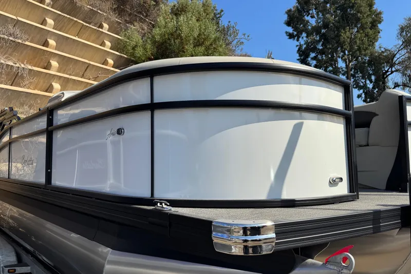 Slide: The Image of 2024 Barletta ARIA 22UC pontoon boat with sleek design and modern features. - 4