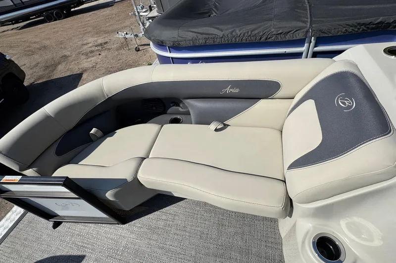 Slide: The Image of 2024 Barletta ARIA 22UC boat interior with beige and gray seating. - 6