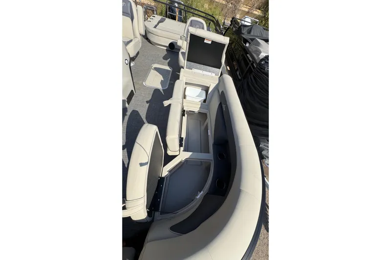 Slide: The Image of 2024 Barletta ARIA 22UC pontoon boat interior with seating and storage compartments. - 9