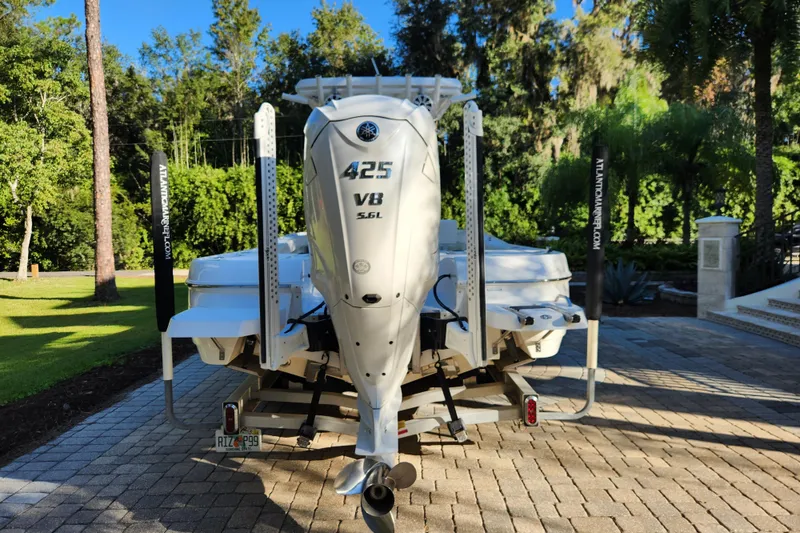 Slide: The Image of 2020 Caymas 28 HB boat with Yamaha 425 V8 engine on a trailer. - 10