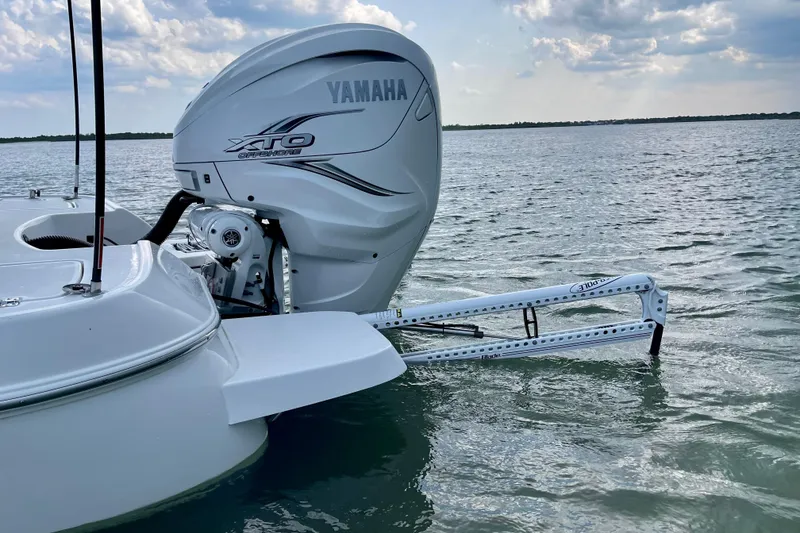Slide: The Image of 2020 Caymas 28 HB boat with Yamaha XTO engine on calm water. - 3