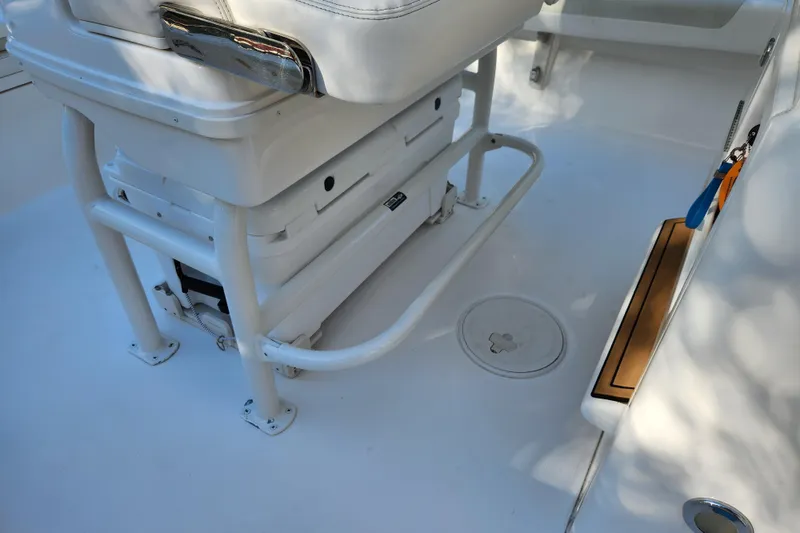 Slide: The Image of 2020 Caymas 28 HB boat interior with seating and storage area. - 35