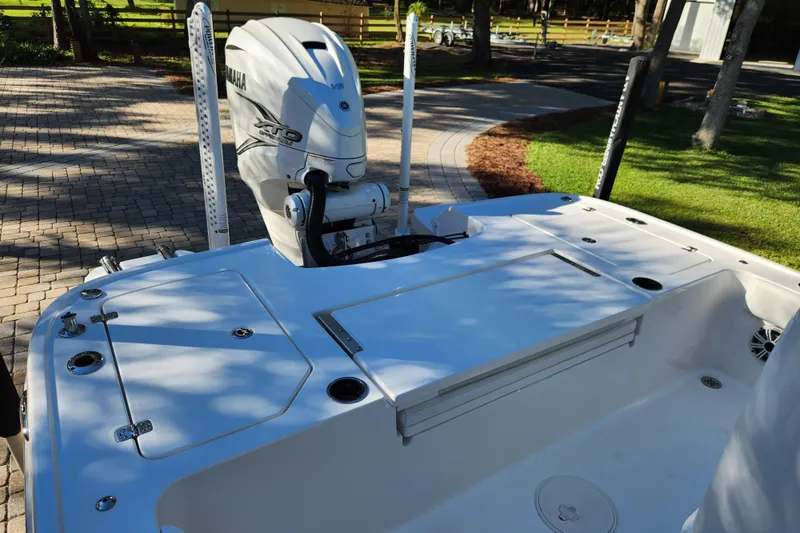 Slide: The Image of 2020 Caymas 28 HB boat with Yamaha engine, docked on a sunny day. - 40