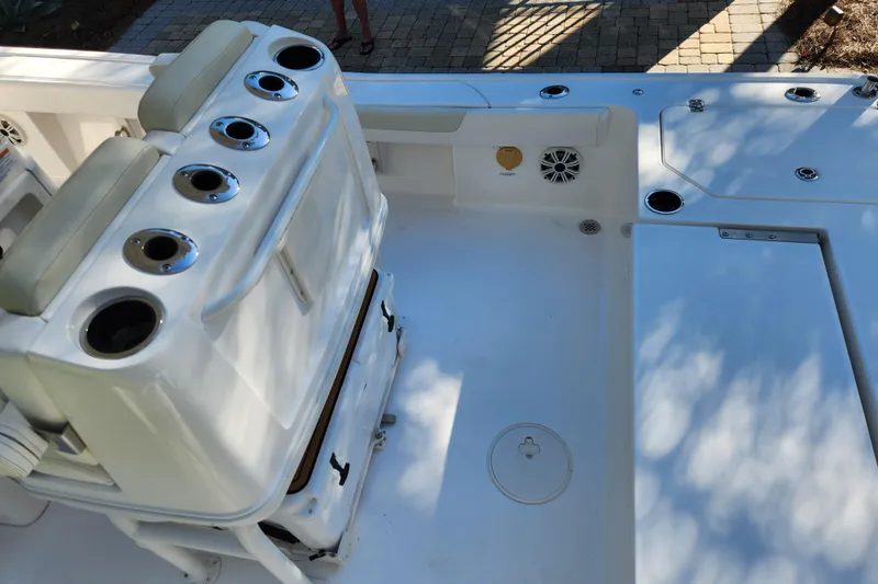 Slide: The Image of 2020 Caymas 28 HB boat interior with seating and cup holders. - 49