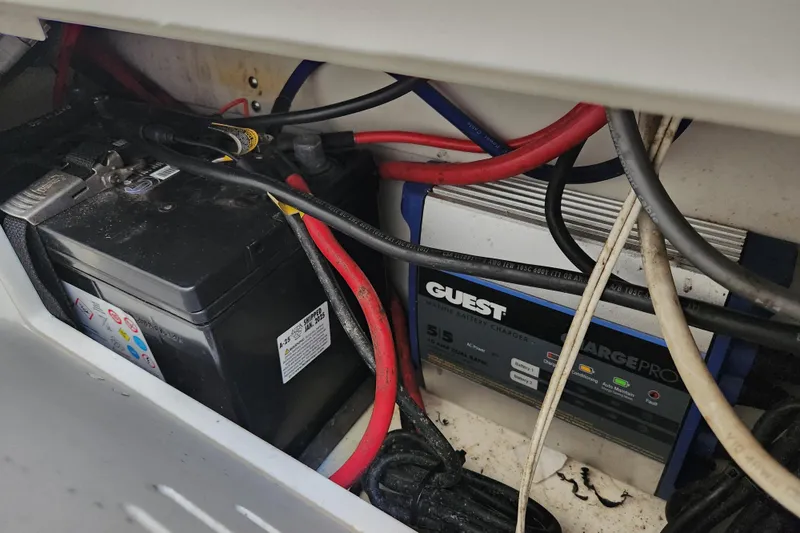 Slide: The Image of 2020 Caymas 28 HB boat battery and Guest marine charger with cables. - 55