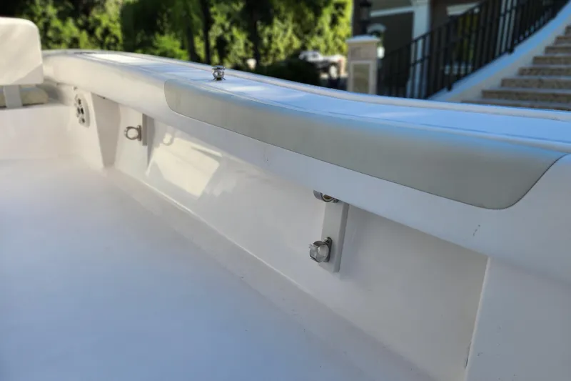 Slide: The Image of 2020 Caymas 28 HB boat interior detail with white seating and sleek design. - 57