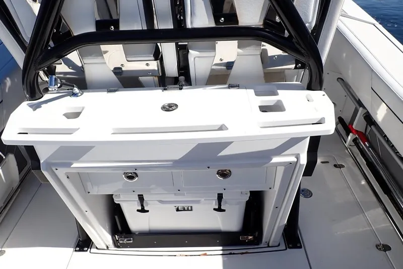 Slide: The Image of Dashboard of 2022 Blackfin 272 CC boat with Garmin displays and controls. - 14