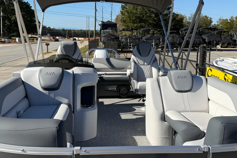 Slide: The Image of 2026 Avalon LSZ Versatile Rear Bench boat interior with plush seating and modern design. - 16