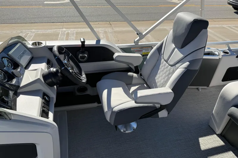 Slide: The Image of 2026 Avalon LSZ Versatile Rear Bench boat interior with modern steering and seating. - 28