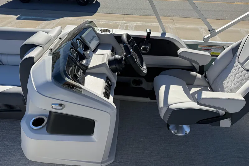 Slide: The Image of 2026 Avalon LSZ Versatile Rear Bench boat interior with modern steering console and comfortable seating. - 29