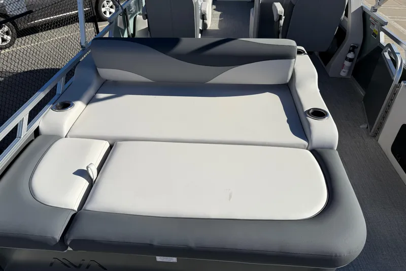 Slide: The Image of 2026 Avalon LSZ Versatile Rear Bench with cup holders on a boat deck. - 36
