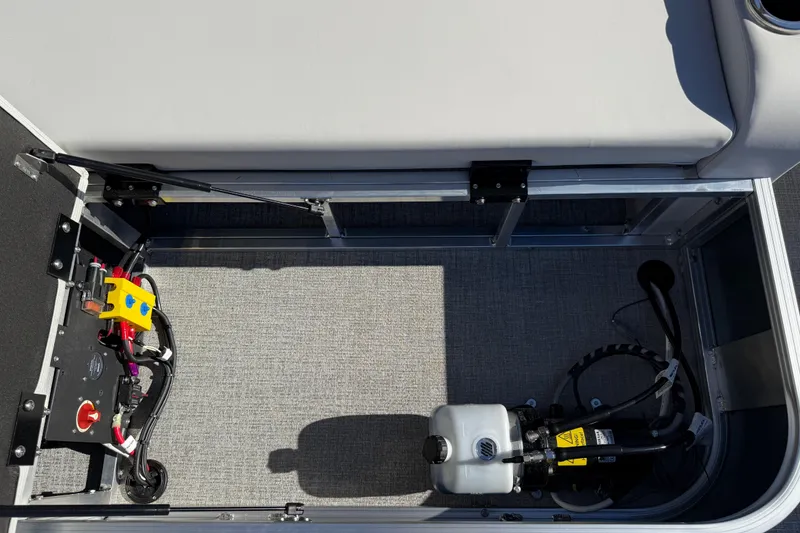 Slide: The Image of 2026 Avalon LSZ Versatile Rear Bench storage compartment with wiring and equipment. - 38