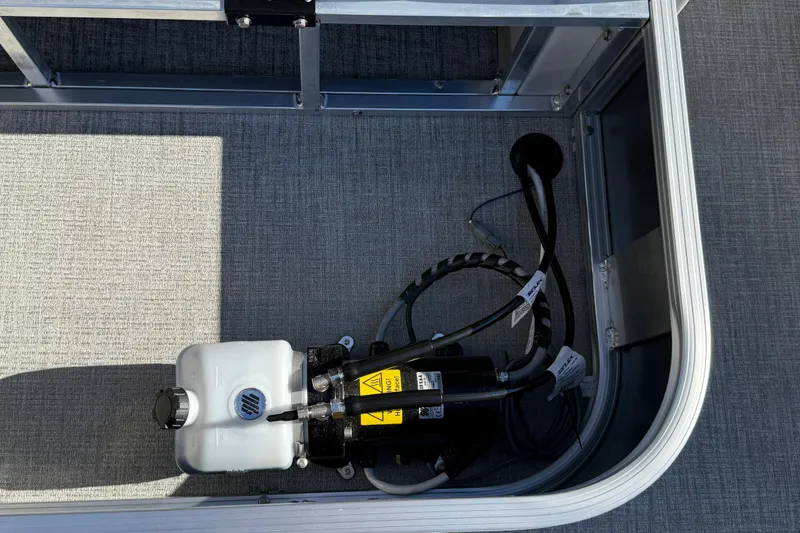 Slide: The Image of 2026 Avalon LSZ Versatile Rear Bench storage compartment with hydraulic system components. - 40