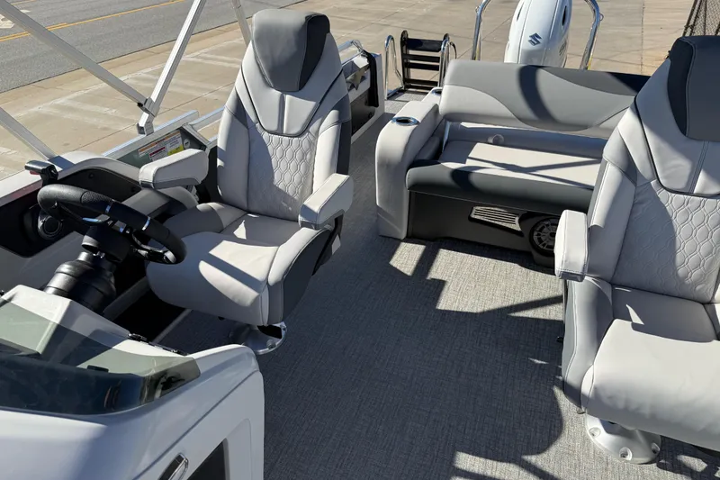 Slide: The Image of 2026 Avalon LSZ Versatile Rear Bench boat interior with modern seating and steering. - 44